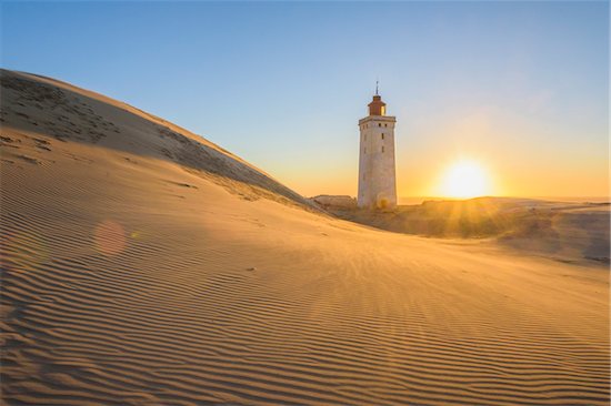 Lighthouse and Dunes, Rubjerg Knude at Sunset, Lokken, North Jutland, Denmark Stock Photo - Premium Royalty-Free, Artist: Raimund Linke, Image code: 600-08512543