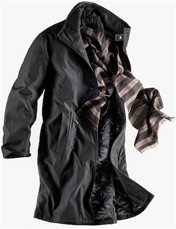 Dark coloured coat with scarf on white background Photographie de stock - Premium Libres de Droits, Code: 600-08542879