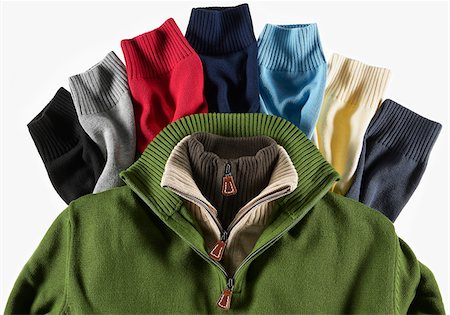 Detail of several sweaters on white background, studio shot Stockbilder - Premium RF Lizenzfrei, Bildnummer: 600-08567206