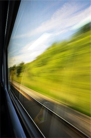 simsearch:696-03396262,k - Looking out Speeding Train Window at Country Side Photographie de stock - Premium Libres de Droits, Code: 600-08639269