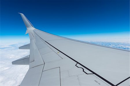 simsearch:600-07760281,k - View of Wing from in Flight Airplane over Alps Foto de stock - Sin royalties Premium, Código: 600-08783035
