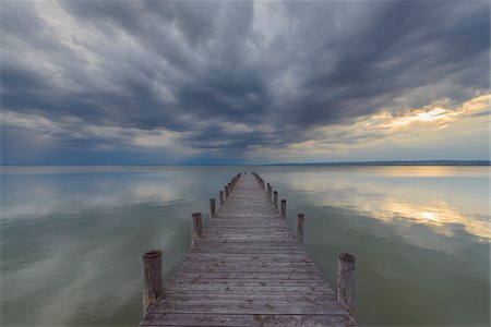 Wooden Jetty at Sunset at Weiden am See, Lake Neusiedl, Burgenland, Austria Foto de stock - Sin royalties Premium, Código: 600-08783097