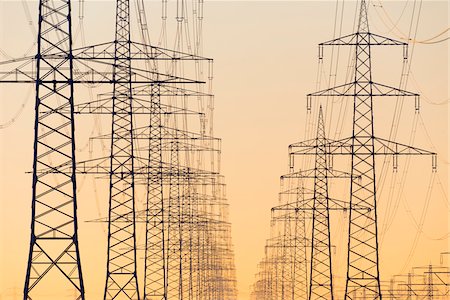 power lines in the sky - Electricity Pylons at Sunset, Hesse, Germany Photographie de stock - Premium Libres de Droits, Code: 600-08797097