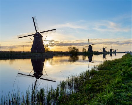 Windmills at Sunrise, Kinderdijk, South Holland, Netherlands Stock Photo - Premium Royalty-Free, Code: 600-08865322