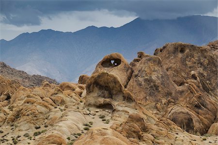 simsearch:600-04223543,k - Rock formations of the Alabama Hills with the Sierra Nevada Mountains in the background in Eastern California, USA Stock Photo - Premium Royalty-Free, Code: 600-08945844