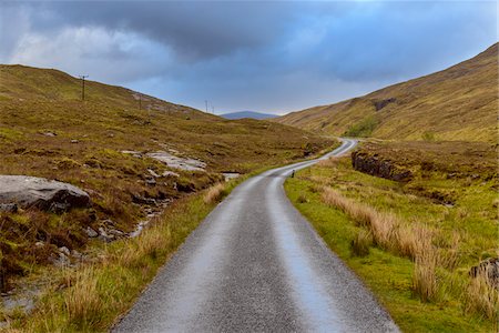 simsearch:841-03869705,k - Winding road in the highlands with a cloudy sky at Glen Coe in Scotland, United Kingdom Foto de stock - Sin royalties Premium, Código: 600-08973449