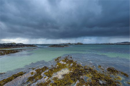 Scottish coast in spring with rain clouds over the ocean at Mallaig in Scotland, United Kingdom Stock Photo - Premium Royalty-Free, Code: 600-08973471