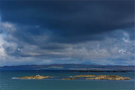 Scottish coast with dark clouds over the ocean at Mallaig in Scotland, United Kingdom Stock Photo - Premium Royalty-Free, Code: 600-08973481