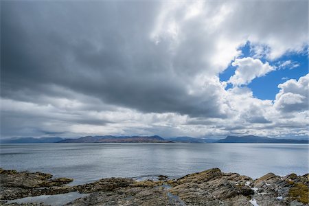 Scottish coast with rainclouds over the Sound of Sleat near Armadale on the Isle of Skye in Scotland, United Kingdom Stock Photo - Premium Royalty-Free, Code: 600-08986446