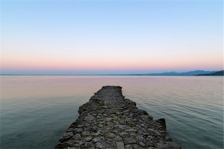 simsearch:600-09022400,k - Angler jetty on Lake Garda (Lago di Garda) at dawn in Garda in Veneto, Italy Stock Photo - Premium Royalty-Free, Code: 600-09022397