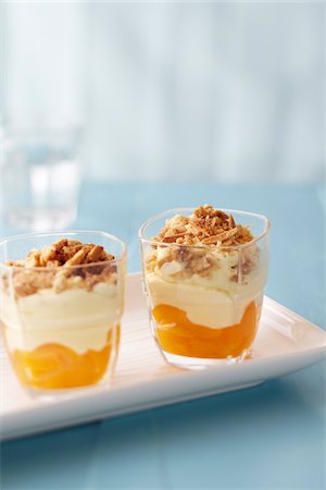 simsearch:600-07156157,k - Fruit parfait with nut topping on a blue background Stockbilder - Premium RF Lizenzfrei, Bildnummer: 600-09119383