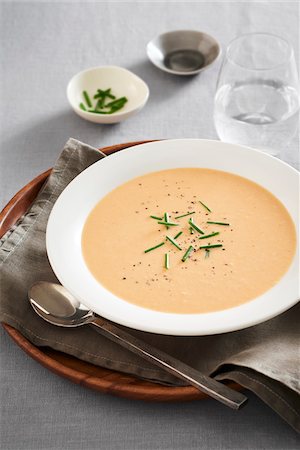 simsearch:600-06025236,k - Bowl of seafood bisque soup with chives and pepper Photographie de stock - Premium Libres de Droits, Code: 600-09155522