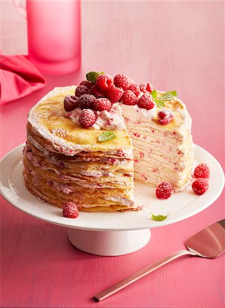 simsearch:600-06451954,k - Raspberry crepe cake on a pedestal cake stand on a pink background Stock Photo - Premium Royalty-Free, Code: 600-09159788