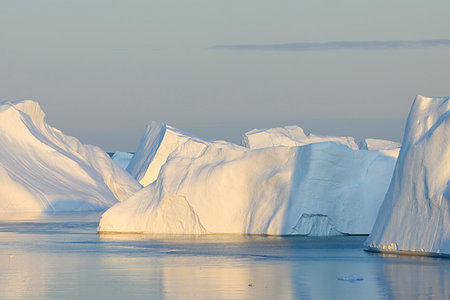 simsearch:600-03456574,k - Icebergs at Ilulissat icefjord, Ilulissat, Icefjord, Disko Bay, Qaasuitsup, Greenland, Polar Regions, Arctic Foto de stock - Royalty Free Premium, Número: 600-09245471