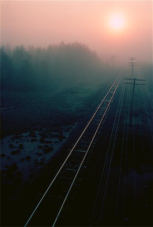 sunset train tracks - Railroad Tracks at Sunset Near Spanish, Ontario, Canada Stock Photo - Premium Royalty-Free, Code: 600-00036291