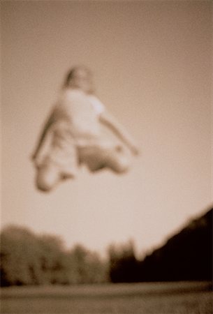 simsearch:600-00073362,k - Blurred View of Girl Jumping Salzburg, Austria Foto de stock - Sin royalties Premium, Código: 600-00038045