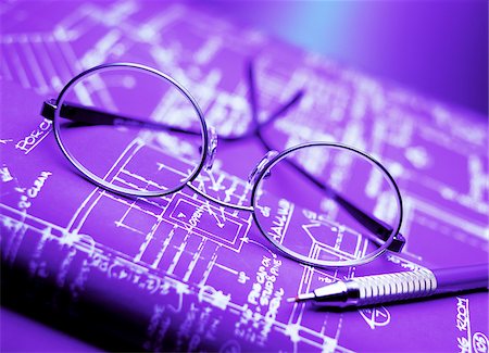 Eyeglasses and Blueprints Stock Photo - Premium Royalty-Free, Code: 600-00044801