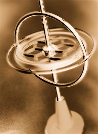 sepia toned - Spinning Gyroscope Stock Photo - Premium Royalty-Free, Code: 600-00055271