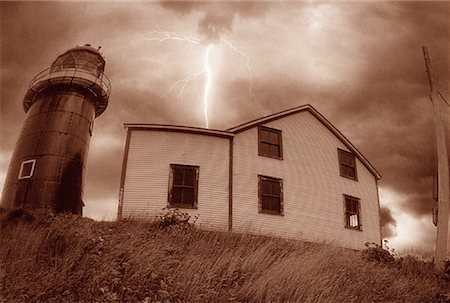 Lighthouse and Lightning, Avalon Peninsula, Newfoundland and Labrador, Canada Stock Photo - Premium Royalty-Free, Code: 600-00058716