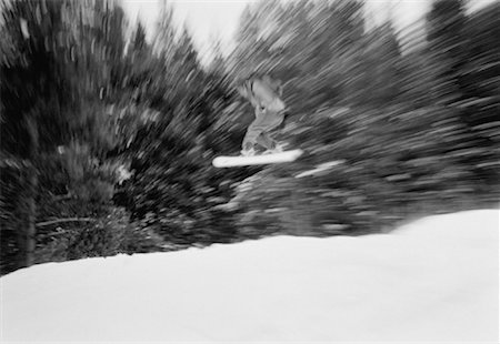 Snowboarder Jumping in Air Stock Photo - Premium Royalty-Free, Code: 600-00059719