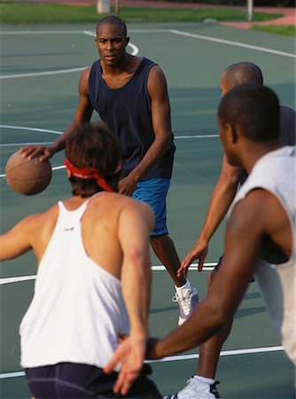 simsearch:700-00064597,k - Four Men Playing Basketball Outdoors Stock Photo - Premium Royalty-Free, Code: 600-00064601