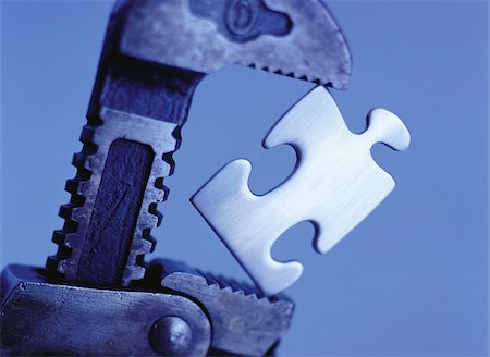 simsearch:600-00065203,k - Close-Up of Pipe Wrench and Puzzle Piece Stock Photo - Premium Royalty-Free, Code: 600-00065196