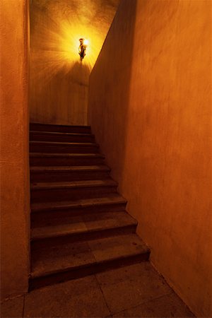 Glowing Lamp in Stairwell, Oaxaca, Mexico Stock Photo - Premium Royalty-Free, Code: 600-00063453