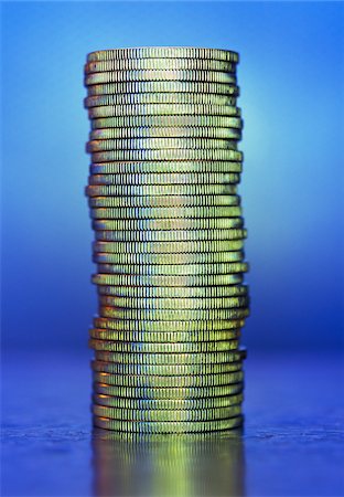 Close-Up of Stack of Coins Stock Photo - Premium Royalty-Free, Code: 600-00083083