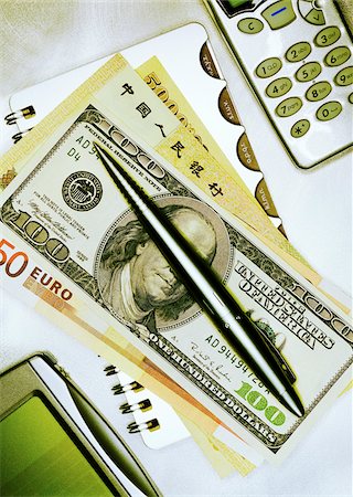 simsearch:600-00152987,k - International Currency and Pen On Notepad with Cell Phone and Electronic Organizer Stock Photo - Premium Royalty-Free, Code: 600-00083967