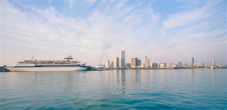 Cruise Ships Against Skyline, Miami, Florida, USA Stock Photo - Premium Royalty-Free, Code: 600-00174126