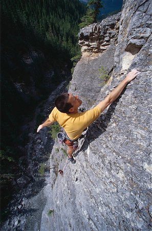 Man Rock Climbing, Kananaskis Country, Alberta, Canada Foto de stock - Sin royalties Premium, Código: 600-00177292