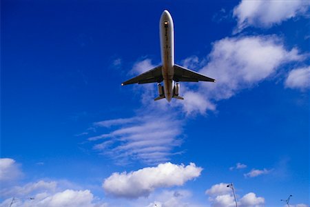 plane sky cloud looking up not people - Plane in Sky, Stock Photo - Premium Royalty-Free, Code: 600-00171302