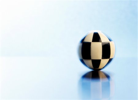 simsearch:600-00057237,k - Spinning Checkered Ball Stock Photo - Premium Royalty-Free, Code: 600-00199221