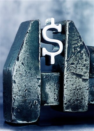 Dollar Sign in a Vice Stock Photo - Premium Royalty-Free, Code: 600-00285466