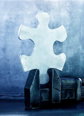 simsearch:600-00065196,k - Puzzle Piece in Vice Stock Photo - Premium Royalty-Free, Code: 600-00285463