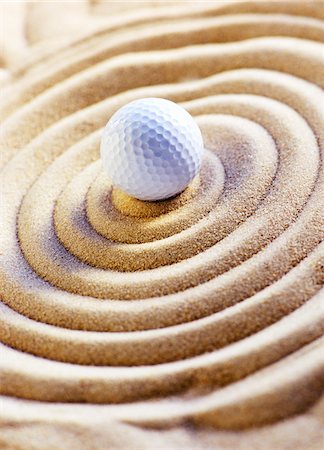 Golf Ball in Sand Stock Photo - Premium Royalty-Free, Code: 600-00280890