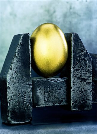 schraubzwinge - Golden Egg Stockbilder - Premium RF Lizenzfrei, Bildnummer: 600-00329248