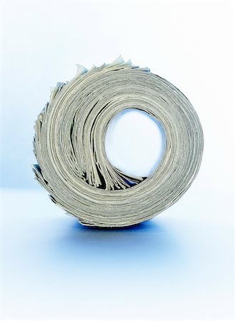 Roll of Cash Foto de stock - Royalty Free Premium, Número: 600-00476868