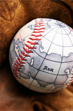 playing a baseball game - Baseball With World Map Stock Photo - Premium Royalty-Free, Code: 600-00550396