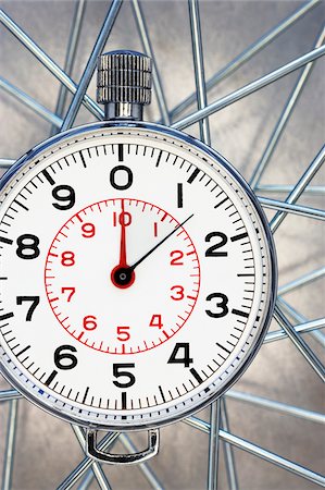 Close-Up of Stopwatch on Bicycle Wheel Stock Photo - Premium Royalty-Free, Code: 600-00608313