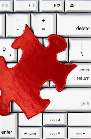 simsearch:600-00035589,k - Red Puzzle Piece on Computer Keyboard Stock Photo - Premium Royalty-Free, Code: 600-00618006