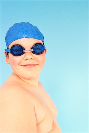 physical activity child - Boy with Swimming Cap and Goggles Stock Photo - Premium Royalty-Free, Code: 600-00795547