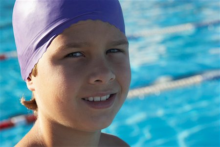 Portrait of Boy by Swimming Pool Stock Photo - Premium Royalty-Free, Code: 600-00814552