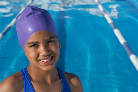 preteen black girl in bathing suit - Portrait of Girl by Swimming Pool Stock Photo - Premium Royalty-Free, Code: 600-00814566