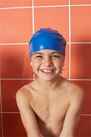 swimming kid in swimming cap photos - Portrait of Boy Stock Photo - Premium Royalty-Free, Code: 600-00814706