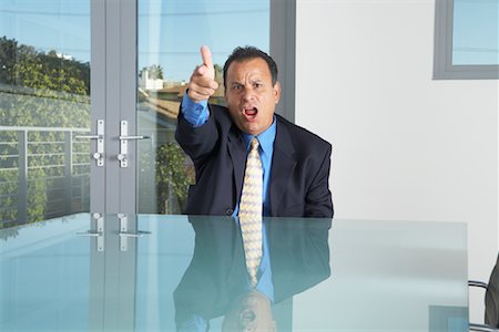 Businessman in Boardroom Stock Photo - Premium Royalty-Free, Code: 600-00819440