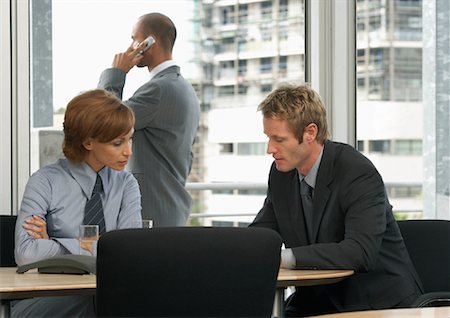 executives on table back - Business People in Office Stock Photo - Premium Royalty-Free, Code: 600-00824158