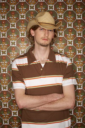 simsearch:700-00683241,k - Young Man Wearing Cowboy Hat Stock Photo - Premium Royalty-Free, Code: 600-00824375