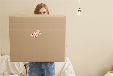 Man Lifting Box Stock Photo - Premium Royalty-Free, Code: 600-00824394