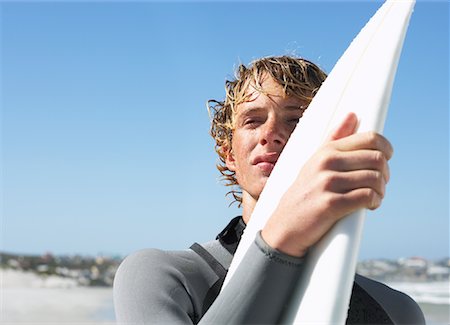 simsearch:700-03439335,k - Surfer At The Beach Stock Photo - Premium Royalty-Free, Code: 600-00824622